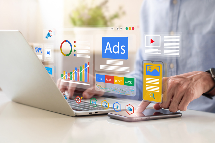 Leverage employer branding with data-driven recruitment marketing. Leverage employer branding with data-driven talent marketing—businessman using a laptop with a digital ads dashboard for targeted recruitment.